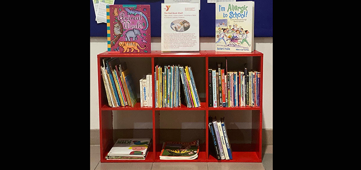 Norwich Family YMCA implements ‘Red Bookshelf’